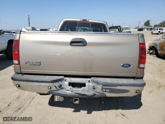 2002 Ford Super Duty F-250 XL with VIN 1FTNX20F12EA19230, listed as a Copart auction lot 74044634 with 392,488 mi miles and Salvage Title. Bid and sale history available at carsss.com. Image 6.