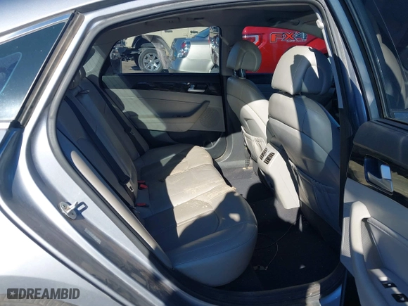 2016 Hyundai Sonata Hybrid Limited with VIN KMHE34L1XGA022774, listed as a IAAI auction lot 41333870 with 145,755 mi miles. Bid and sale history available at carsss.com. Image 8.