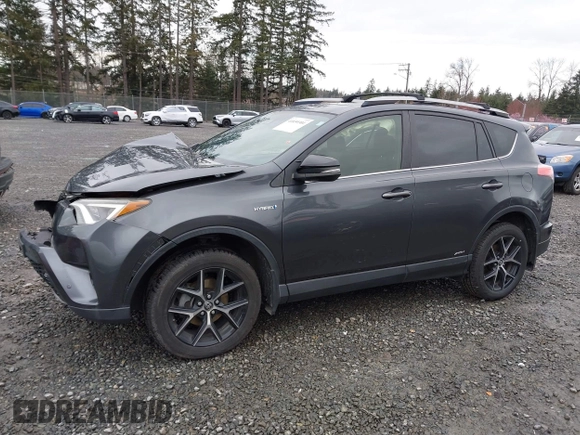 2018 Toyota RAV4 Hybrid SE with VIN JTMJJREV7JD208249, listed as a IAAI auction lot 41859301 with 91,899 mi miles and . Bid and sale history available at DreamBid. Image 14.