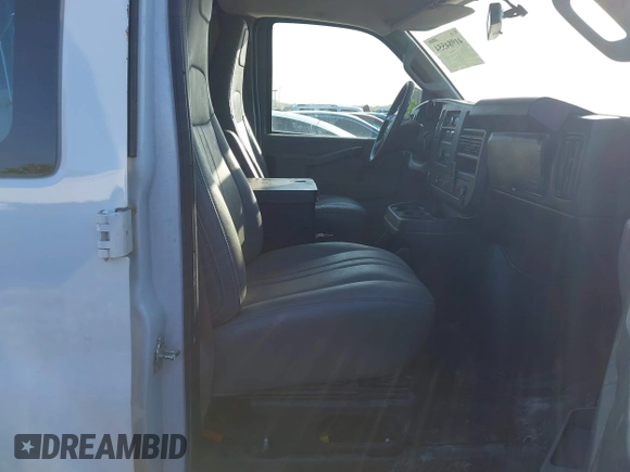 2019 Chevrolet Express Cargo Van with VIN 1GCWGAFPXK1164773, listed as a IAAI auction lot 41984554 with 87,916 mi miles. Bid and sale history available at carsss.com. Image 5.