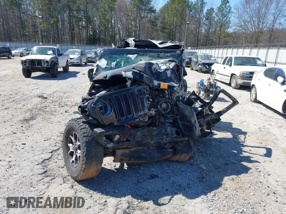 2020 Jeep Wrangler Unlimited Rubicon with VIN 1C4HJXFG2LW147242, listed as a IAAI auction lot 41630952 with Not provided miles and . Bid and sale history available at DreamBid. Image 6.