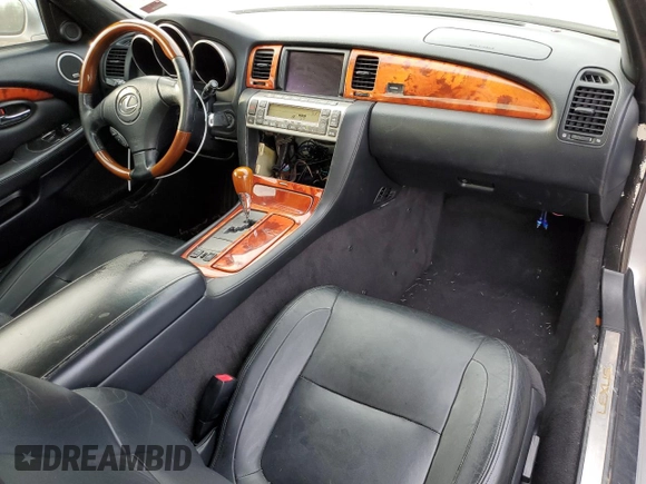 2006 Lexus SC 430 z VIN JTHFN48Y369000493, wystawiony jako Copart lot #46929945 z przebiegiem 141 704 mil mil oraz Szkody całkowita. Historia ofert i sprzedaży dostępna na DreamBid. Obrazek 8.