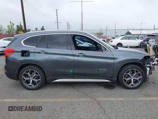 2016 BMW X1 xDrive28i with VIN WBXHT3C32GP886084, listed as a IAAI auction lot 41895754 with 85,662 mi miles and . Bid and sale history available at DreamBid. Image 14.