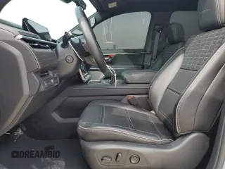 2024 GMC Sierra 1500 with VIN 1GT401EL3RU401137, listed as a Copart auction lot 82851714 with 5,005 mi miles and Salvage Title. Bid and sale history available at DreamBid. Image 7.