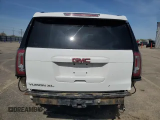 2016 GMC Yukon XL SLT with VIN 1GKS2GKC6GR228033, listed as a Copart auction lot 52450055 with 135,476 mi miles and Salvage Title. Bid and sale history available at DreamBid. Image 6.