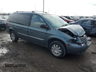 2006 Chrysler Town & Country Touring with VIN 2A4GP54L96R618650, listed as a Copart auction lot 52519325 with 130,234 mi miles and Salvage title. Bid and sale history available at DreamBid. Image 4.