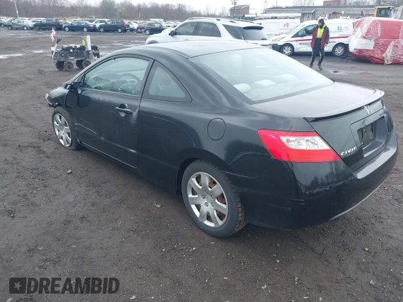 2010 Honda Civic Cpe LX with VIN 2HGFG1B65AH506256, listed as a IAAI auction lot 41942862 with 142,683 mi miles. Bid and sale history available at carsss.com. Image 3.