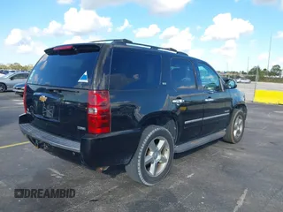 2012 Chevrolet Tahoe LTZ with VIN 1GNSKCE04CR218348, listed as a IAAI auction lot 41541342 with 96,365 mi miles and . Bid and sale history available at DreamBid. Image 4.