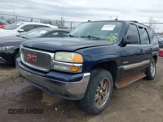 2004 GMC Yukon SLT with VIN 1GKEK13Z74R114583, listed as a IAAI auction lot 41834400 with 311,567 mi miles. Bid and sale history available at carsss.com. Image 17.