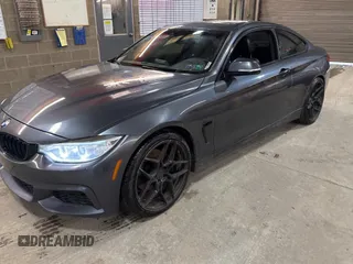 2014 BMW 4 Series 428i xDrive with VIN WBA3N5C56EF716258, listed as a Copart auction lot 52916185 with 106,512 mi miles and Salvage Title. Bid and sale history available at DreamBid. Image 2.