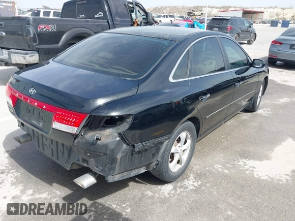 2006 Hyundai Azera SE with VIN KMHFC46F06A113482, listed as a IAAI auction lot 41733834 with 242,159 mi miles and . Bid and sale history available at DreamBid. Image 4.