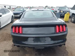 2015 Ford Mustang EcoBoost z VIN 1FA6P8TH6F5370313, wystawiony jako IAAI lot #42206594 z przebiegiem 76 769 mil mil oraz . Historia ofert i sprzedaży dostępna na DreamBid. Obrazek 16.