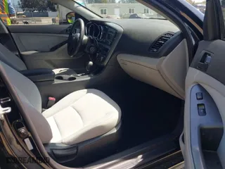 2012 Kia Optima LX with VIN 5XXGM4A71CG082636, listed as a IAAI auction lot 41862116 with 141,753 mi miles. Bid and sale history available at carsss.com. Image 5.