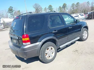 2006 Ford Escape XLT with VIN 1FMCU931X6KB64889, listed as a IAAI auction lot 41779430 with 202,177 mi miles. Bid and sale history available at carsss.com. Image 4.
