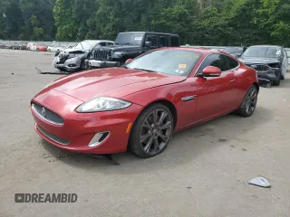 2013 Jaguar XK with VIN SAJWA4FB2DLB50515, listed as a Copart auction lot 66511554 with 147,876 mi miles and Salvage Title. Bid and sale history available at carsss.com. Image 1.