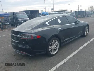 2014 Tesla Model S 60 with VIN 5YJSA1H13EFP33693, listed as a IAAI auction lot 42132094 with Not Provided miles and . Bid and sale history available at DreamBid. Image 4.