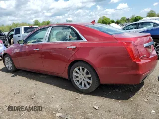 2014 Cadillac CTS Luxury RWD with VIN 1G6AR5SXXE0144084, listed as a Copart auction lot 52644604 with 99,262 mi miles and Salvage Title. Bid and sale history available at carsss.com. Image 2.