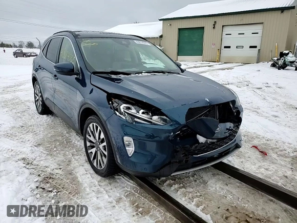 2020 Ford Escape Titanium Hybrid z VIN 1FMCU9DZ0LUA74302, wystawiony jako Copart lot #48614065 z przebiegiem 91 923 mil mil oraz Szkoda całkowita • Salvage title. Historia ofert i sprzedaży dostępna na DreamBid. Obrazek 14.