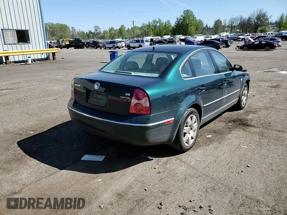 2002 Volkswagen Passat GLX z VIN WVWTH63B72P066013, wystawiony jako Copart lot #53750585 z przebiegiem 114 175 mil mil oraz Szkoda całkowita • Salvage title. Historia ofert i sprzedaży dostępna na DreamBid. Obrazek 13.