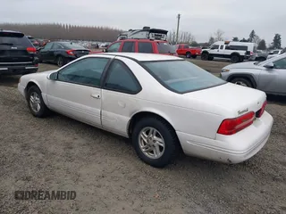1996 Ford Thunderbird LX with VIN 1FALP6246TH160357, listed as a IAAI auction lot 41442234 with 99,815 mi miles and . Bid and sale history available at DreamBid. Image 3.