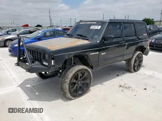 1998 Jeep Cherokee Sport z VIN 1J4FJ68S8WL193483, wystawiony jako Copart lot #58368705 z przebiegiem 94 462 mil mil oraz Szkoda całkowita • Salvage title. Historia ofert i sprzedaży dostępna na DreamBid. Obrazek 1.