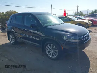 2014 Volkswagen Tiguan SEL with VIN WVGBV3AX6EW535339, listed as a IAAI auction lot 42477963 with 94,588 mi miles and . Bid and sale history available at DreamBid. Image 1.