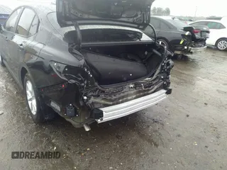 2025 Toyota Camry LE with VIN 4T1DAACK5SU060431, listed as a IAAI auction lot 41552223 with 2,490 mi miles and . Bid and sale history available at DreamBid. Image 6.