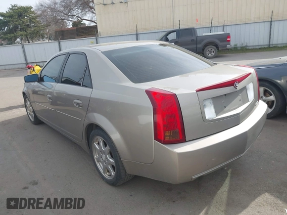 2003 Cadillac CTS with VIN 1G6DM57N730116792, listed as a IAAI auction lot 41686845 with 121,590 mi miles. Bid and sale history available at carsss.com. Image 3.