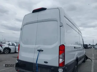2020 Ford Transit Cargo with VIN 1FTBW3XG2LKB18281, listed as a IAAI auction lot 42022187 with 84,323 mi miles. Bid and sale history available at carsss.com. Image 4.