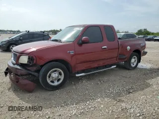 2003 Ford F-150 XL with VIN 2FTRX07W93CA43472, listed as a Copart auction lot 59001755 with 137,586 mi miles and Salvage title. Bid and sale history available at DreamBid. Image 1.
