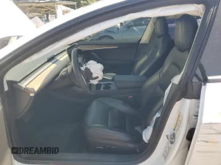 2023 Tesla Model 3 with VIN 5YJ3E1EA8PF394705, listed as a Copart auction lot 52319945 with 58,193 mi miles and Salvage title. Bid and sale history available at DreamBid. Image 7.