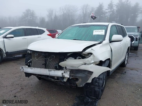 2012 Toyota Highlander with VIN 5TDBK3EH2CS117745, listed as a IAAI auction lot 41912110 with 216,449 mi miles. Bid and sale history available at carsss.com. Image 6.