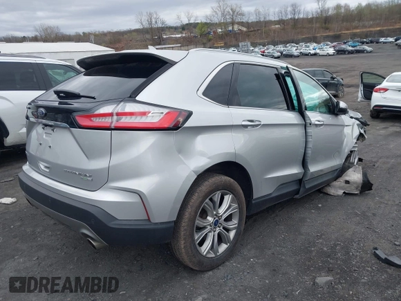 2019 Ford Edge Titanium with VIN 2FMPK4K95KBB55619, listed as a IAAI auction lot 42048941 with 89,999 mi miles. Bid and sale history available at carsss.com. Image 4.