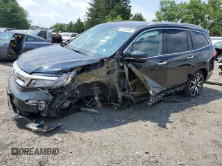 2020 Honda Pilot Touring 8-Passenger with VIN 5FNYF5H95LB021658, listed as a Copart auction lot 58878594 with 36,122 mi miles and Salvage Title. Bid and sale history available at DreamBid. Image 1.