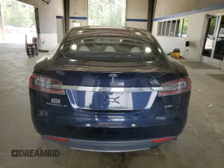 2014 Tesla Model S 60 with VIN 5YJSA1H10EFP52850, listed as a Copart auction lot 54321805 with 58,031 mi miles and Salvage Title. Bid and sale history available at DreamBid. Image 6.