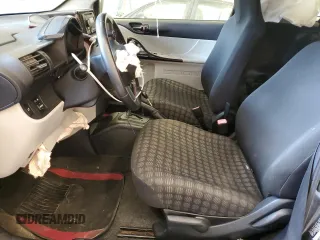 2012 Scion iQ with VIN JTNJJXB07CJ018013, listed as a Copart auction lot 57101085 with 91,370 mi miles and Non repairable. Bid and sale history available at DreamBid. Image 7.