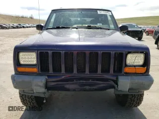 1999 Jeep Cherokee Sport z VIN 1J4FF68S8XL604061, wystawiony jako Copart lot #53175345 z przebiegiem 206 698 mil mil oraz Nie do naprawy • Non repairable. Historia ofert i sprzedaży dostępna na DreamBid. Obrazek 5.