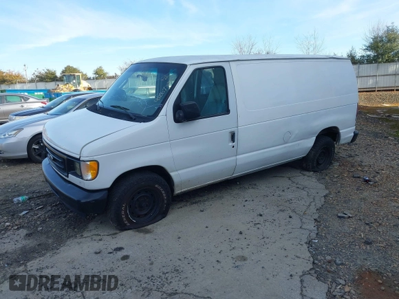 2003 Ford Econoline Cargo with VIN 1FTRE14263HA39384, listed as a IAAI auction lot 41267380 with 317,767 mi miles and . Bid and sale history available at DreamBid. Image 2.