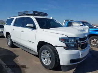 2019 Chevrolet Suburban LT with VIN 1GNSCHKC3KR143942, listed as a IAAI auction lot 41896633 with 153,139 mi miles and . Bid and sale history available at DreamBid. Image 1.