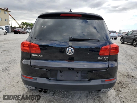 2014 Volkswagen Tiguan SE with VIN WVGAV3AXXEW543245, listed as a Copart auction lot 42288905 with 92,851 mi miles and Salvage title. Bid and sale history available at DreamBid. Image 6.