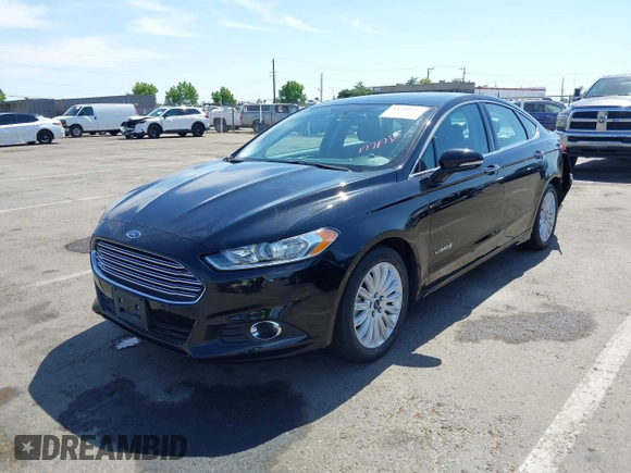 2016 Ford Fusion SE Hybrid with VIN 3FA6P0LU9GR405102, listed as a IAAI auction lot 42358807 with 91,130 mi miles and . Bid and sale history available at DreamBid. Image 2.