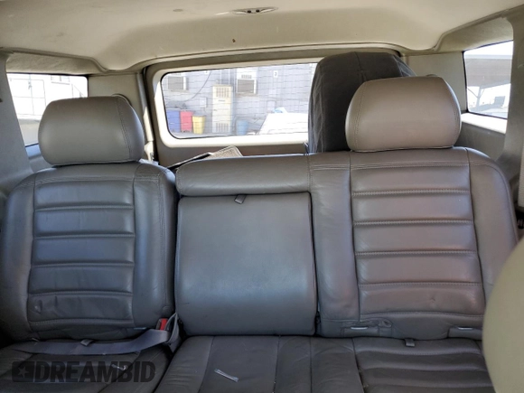2003 Hummer H2 with VIN 5GRGN23U93H132656, listed as a Copart auction lot 71987404 with 152,287 mi miles and Salvage Title. Bid and sale history available at carsss.com. Image 10.
