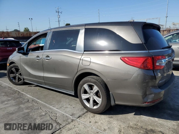 2018 Honda Odyssey EX-L with VIN 5FNRL6H78JB003220, listed as a Copart auction lot 48493355 with 127,807 mi miles and Salvage Title. Bid and sale history available at carsss.com. Image 2.