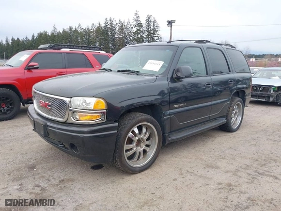 2003 GMC Yukon Denali with VIN 1GKEK63U73J310098, listed as a IAAI auction lot 41831615 with 262,134 mi miles. Bid and sale history available at carsss.com. Image 2.
