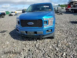 2019 Ford F-150 XL with VIN 1FTEX1EP2KKF20835, listed as a Copart auction lot 70089304 with 87,402 mi miles and Salvage title. Bid and sale history available at DreamBid. Image 11.