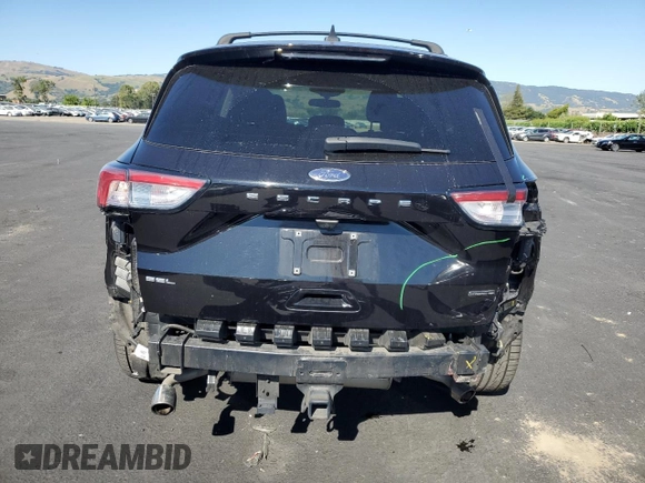 2021 Ford Escape SEL Hybrid with VIN 1FMCU9CZXMUA27278, listed as a Copart auction lot 55123635 with 46,930 mi miles and Salvage title. Bid and sale history available at DreamBid. Image 6.