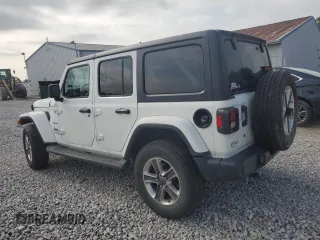 2019 Jeep Wrangler Unlimited Sahara с VIN 1C4HJXEG6KW580031, выставлен на аукционе Copart как лот 59687835 с пробегом 136 590 миль миль и Списание • Salvage title. История ставок и продаж доступна на DreamBid. Изображение 2.