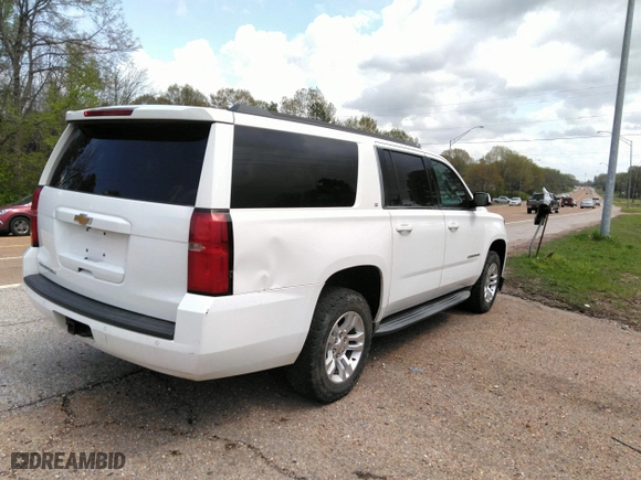 2015 Chevrolet Suburban LT with VIN 1GNSCJKC6FR229260, listed as a IAAI auction lot 41974363 with 251,395 mi miles. Bid and sale history available at carsss.com. Image 4.