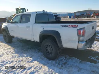 2021 Toyota Tacoma 4WD SR5 with VIN 3TMDZ5BN6MM105593, listed as a IAAI auction lot 41424096 with 39,215 mi miles. Bid and sale history available at carsss.com. Image 3.