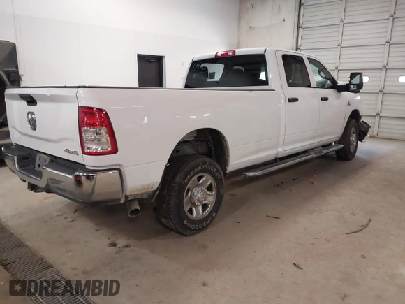 2023 Ram 2500 Tradesman z VIN 3C6UR5HL0PG529660, wystawiony jako IAAI lot #41491722 z przebiegiem 43 672 mil mil oraz . Historia ofert i sprzedaży dostępna na DreamBid. Obrazek 4.